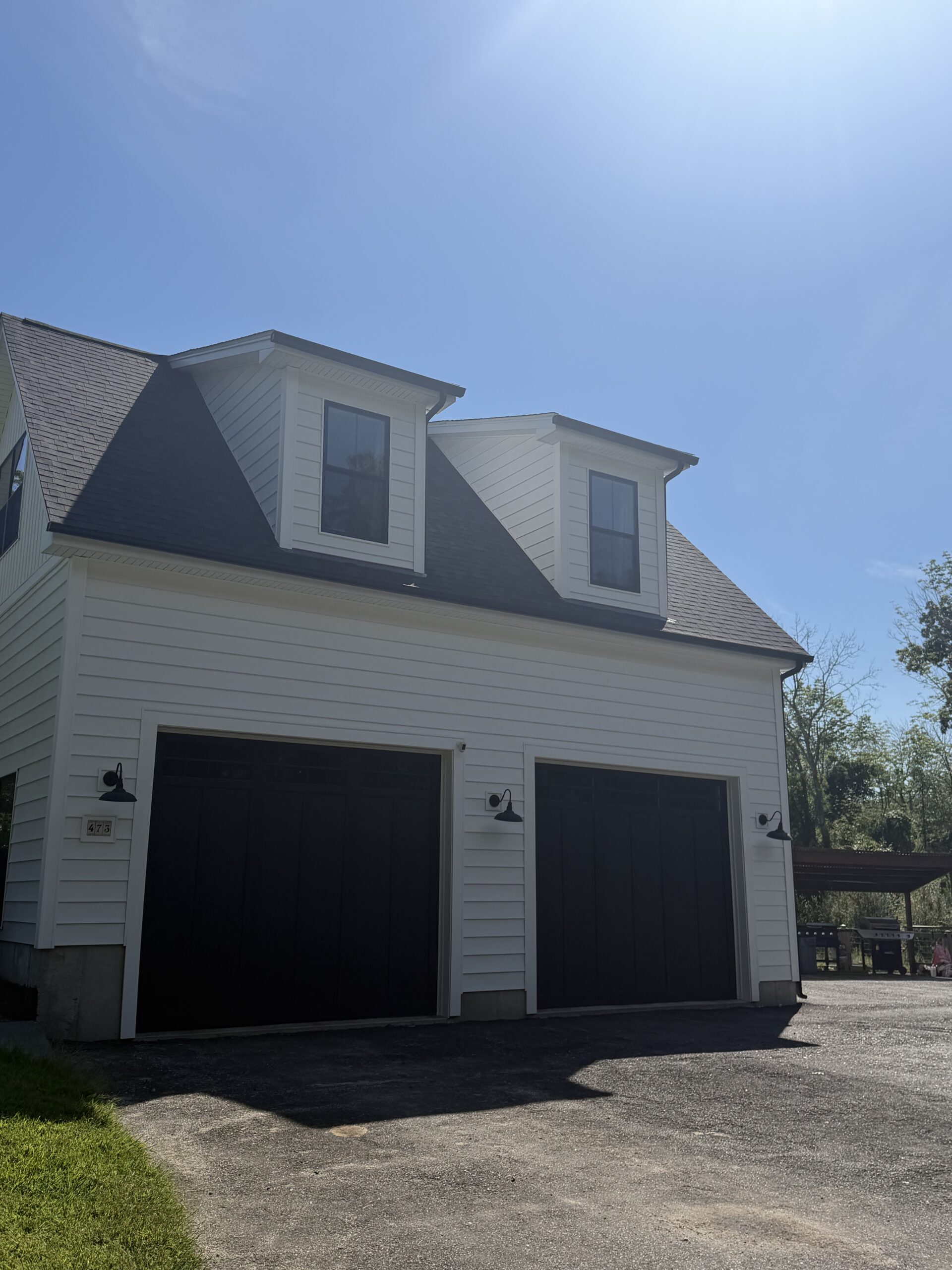 Completed garage roof replacement with dormers